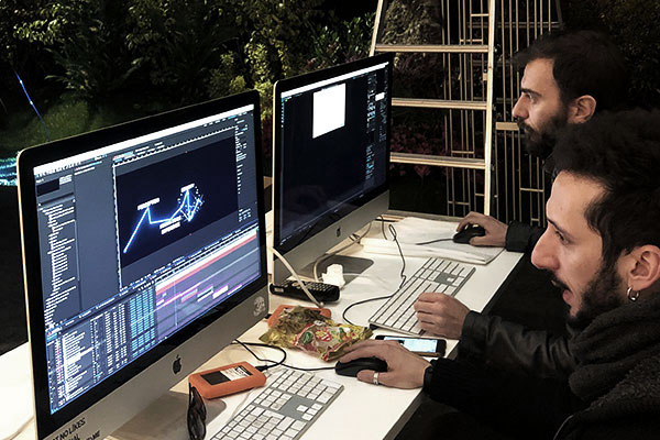 cromazoo team working on the video mapping for artemide