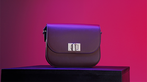 Furla bag on pink background