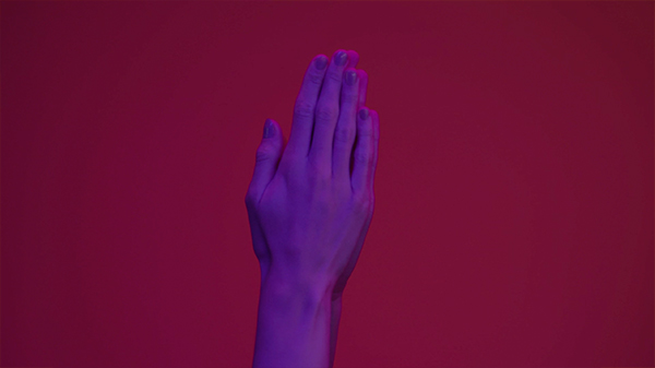 Hand clap in pink background
